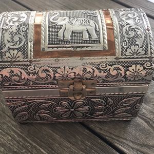 Ornate silver/copper tone box with elephant